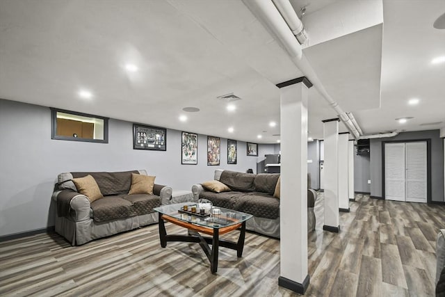 69 Greenwood St, Boston, MA 02122 - living room featuring wood finished floors, baseboards, and recessed lighting