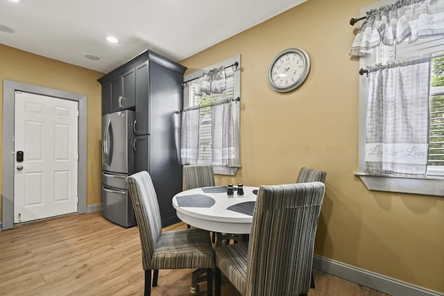69 Greenwood St, Boston, MA 02122 - dining area featuring light wood-style flooring and baseboards
