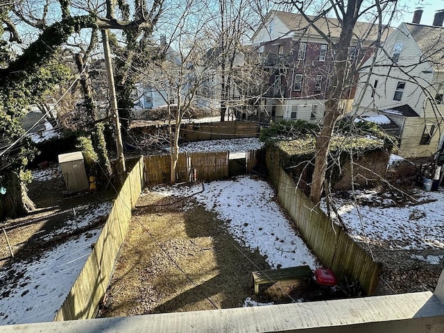 view of yard covered in snow