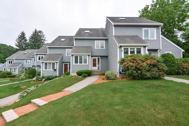 31 Blithewood Ave Unit 106, Worcester, MA 01604 - view of front facade with a front yard and roof with shingles
