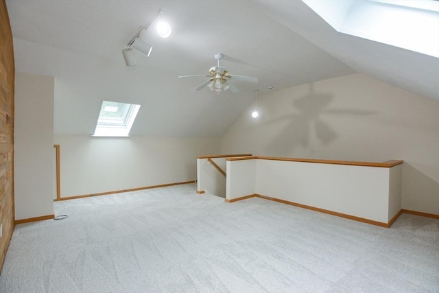 31 Blithewood Ave Unit 106, Worcester, MA 01604 - additional living space with a skylight, carpet flooring, ceiling fan, and vaulted ceiling