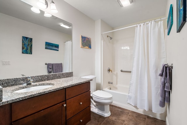 full bathroom featuring vanity, toilet, tile patterned floors, and shower / bath combination with curtain