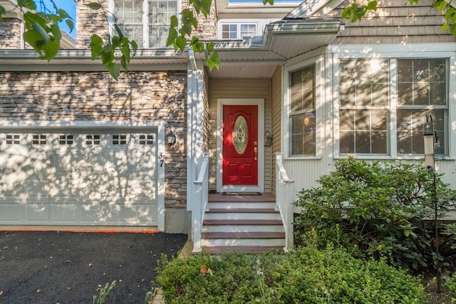 entrance to property featuring a garage