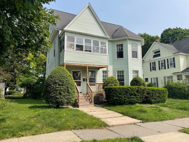 6 Newton Ave, Worcester, MA 01602 - view of front facade with a porch, a front yard, and roof with shingles