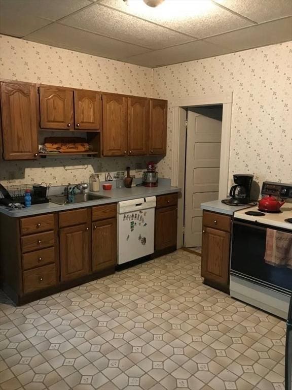 6 Newton Ave, Worcester, MA 01602 - kitchen featuring white dishwasher, wallpapered walls, electric range oven, a paneled ceiling, and a sink