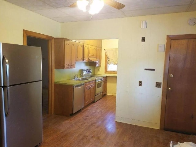6 Newton Ave, Worcester, MA 01602 - kitchen with stainless steel appliances, dark wood-style flooring, a ceiling fan, light countertops, and a sink
