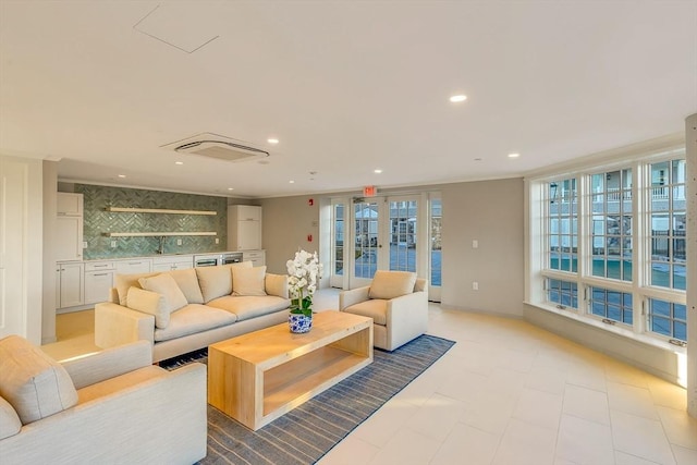 128 Elm St Unit 312, Cohasset, MA 02025 - living area featuring recessed lighting, a community bar, and french doors