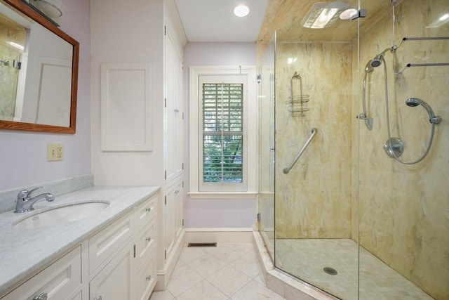 53 Abbott Rd, Wellesley, MA 02481 - full bath featuring a shower stall, tile patterned floors, vanity, and baseboards