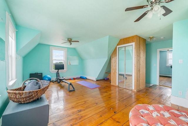 158 Cadish, Hull, MA 02045 - workout area with baseboard heating, a ceiling fan, wood-type flooring, lofted ceiling, and baseboards