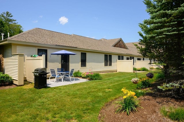 599 Washington St Unit 1, Pembroke, MA 02359 - rear view of house with a patio area and a shingled roof
