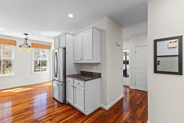 kitchen with freestanding refrigerator, recessed lighting, baseboards, and dark wood-type flooring