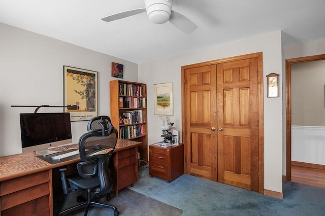 office area featuring carpet flooring and ceiling fan
