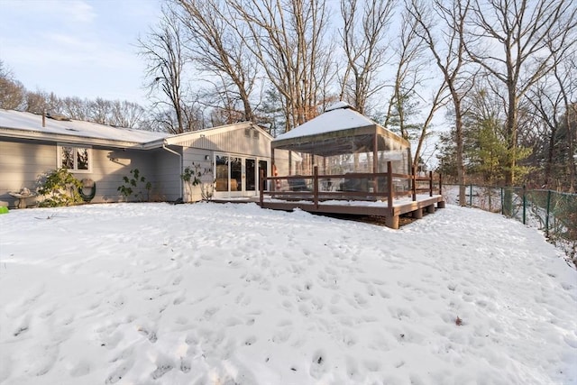 snow covered house featuring a gazebo