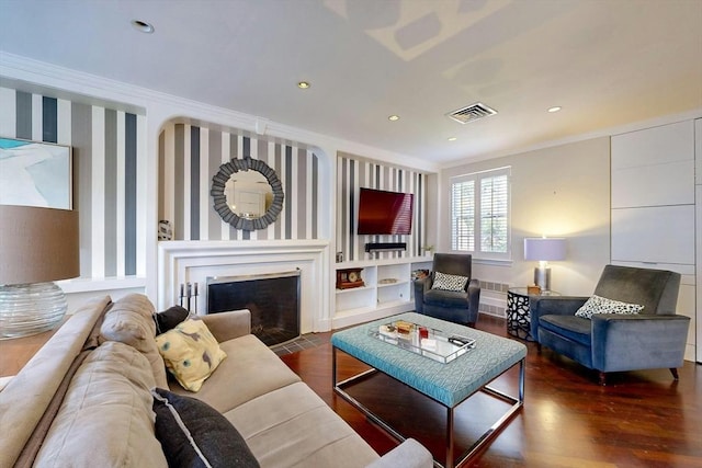 living room with ornamental molding and dark wood-type flooring