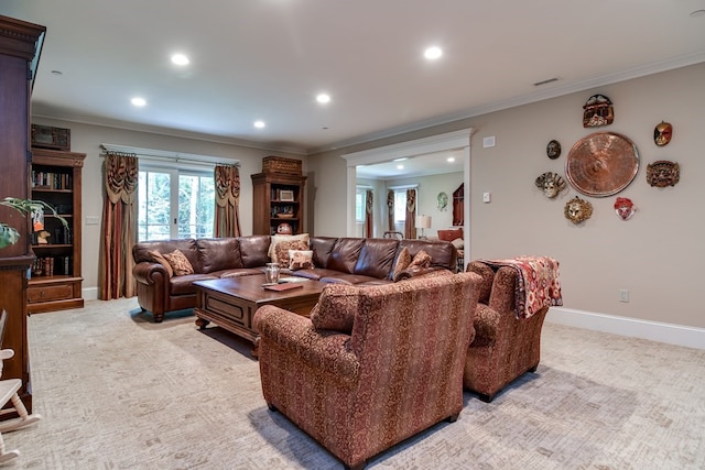 living room featuring crown molding and light colored carpet