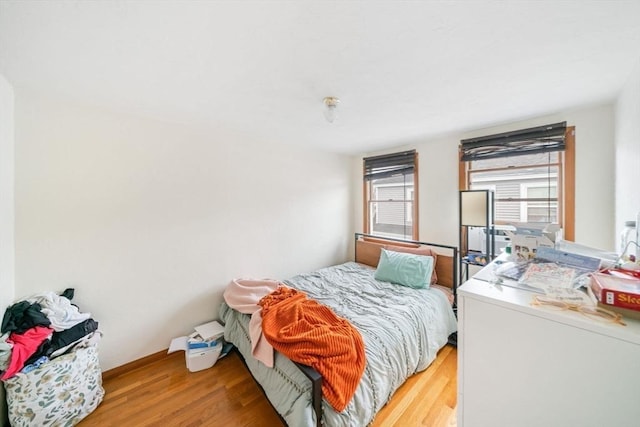 bedroom featuring light wood-type flooring