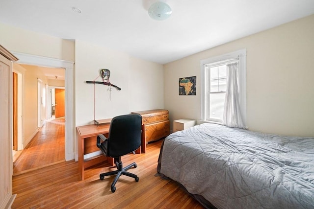 bedroom featuring light wood-type flooring