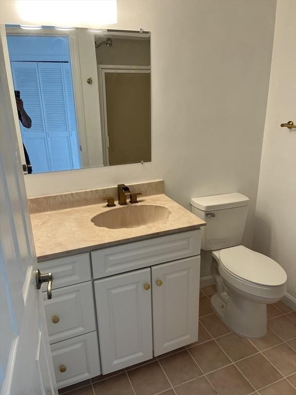 24 Highland Ter Unit 2415, Plymouth, MA 02360 - bathroom with tile patterned flooring, toilet, and vanity