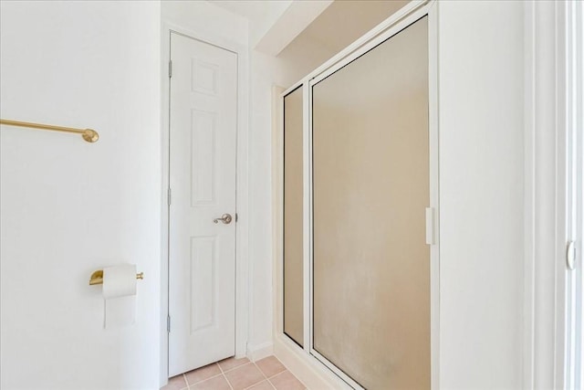 24 Highland Ter Unit 2415, Plymouth, MA 02360 - bathroom with a shower stall and tile patterned flooring