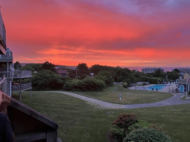 24 Highland Ter Unit 2415, Plymouth, MA 02360 - yard at dusk with a lawn and an outdoor pool
