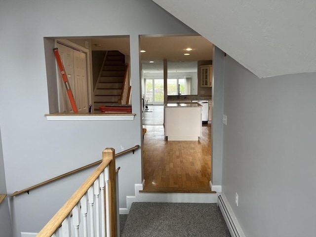 24 Highland Ter Unit 2415, Plymouth, MA 02360 - staircase with baseboards, recessed lighting, wood finished floors, and baseboard heating