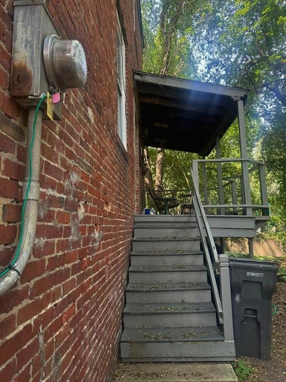10 Eldridge Pl, Chelsea, MA 02150 - view of side of home featuring brick siding and stairway
