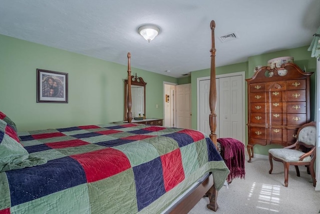 bedroom with visible vents and carpet floors