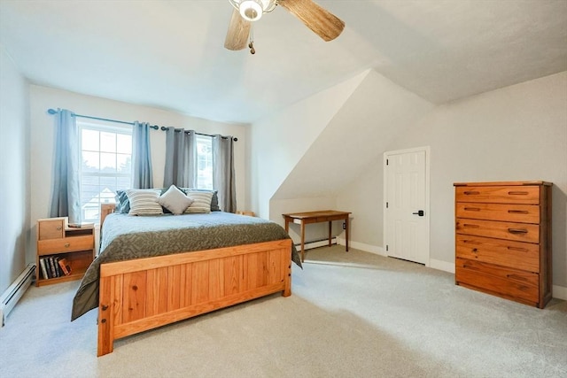 carpeted bedroom with lofted ceiling, a baseboard heating unit, and ceiling fan