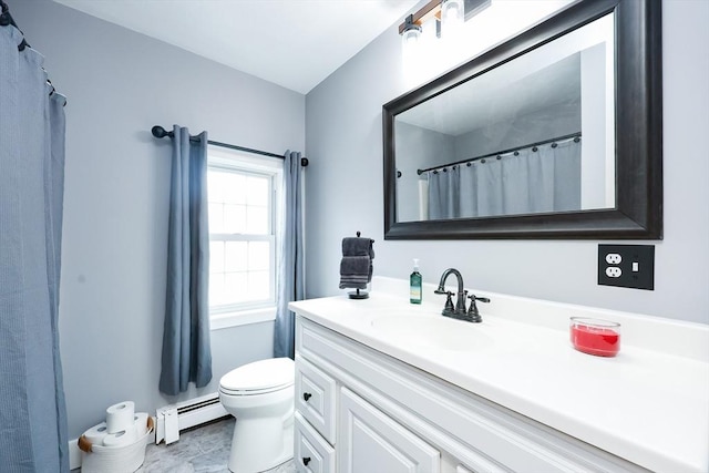 bathroom featuring a baseboard radiator, vanity, and toilet