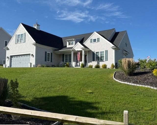 1 Karas Way, Plymouth, MA 02360 - view of front of house with a garage, a front lawn, and a porch