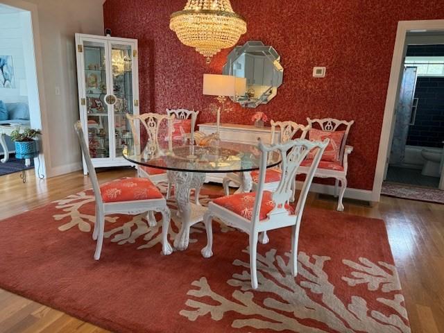 1 Karas Way, Plymouth, MA 02360 - dining area featuring wood finished floors, a chandelier, and baseboards