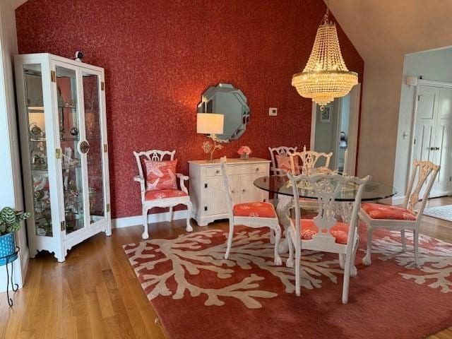 1 Karas Way, Plymouth, MA 02360 - dining room with wood finished floors, a chandelier, vaulted ceiling, and baseboards