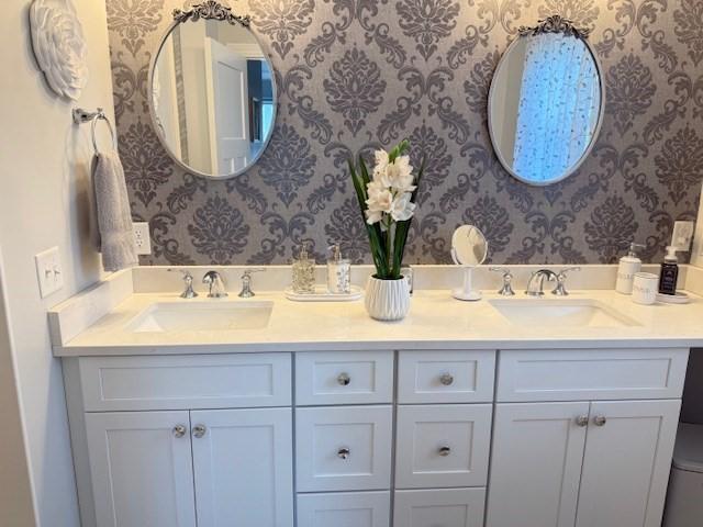 1 Karas Way, Plymouth, MA 02360 - bathroom with wallpapered walls and double vanity