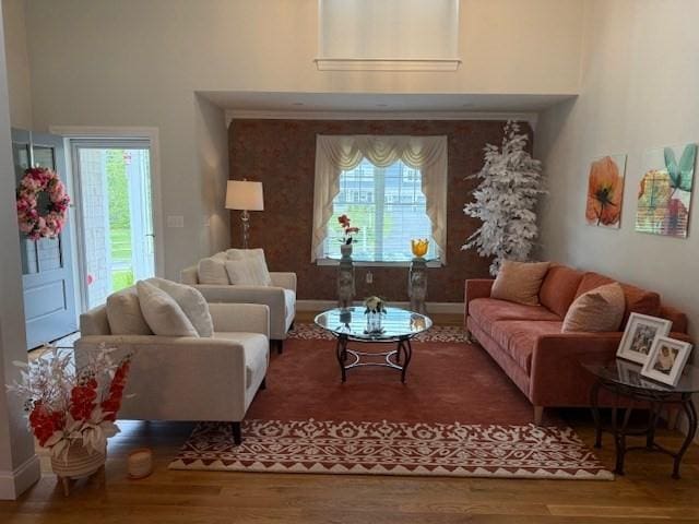 1 Karas Way, Plymouth, MA 02360 - living area with wood finished floors, healthy amount of natural light, a high ceiling, and baseboards