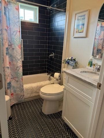 1 Karas Way, Plymouth, MA 02360 - bathroom with toilet, vanity, shower / bath combo with shower curtain, and tile patterned flooring