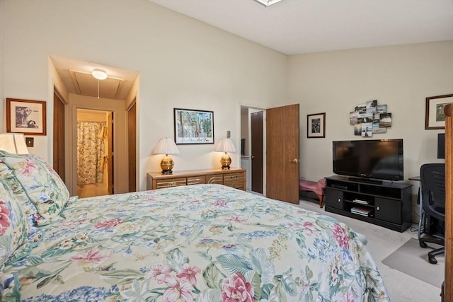 carpeted bedroom with attic access