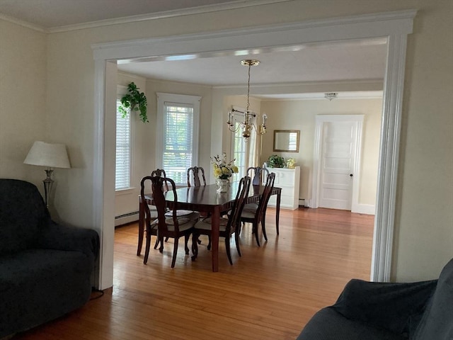 16 Knox St, Worcester, MA 01603 - dining room featuring light wood-style floors, a chandelier, and crown molding