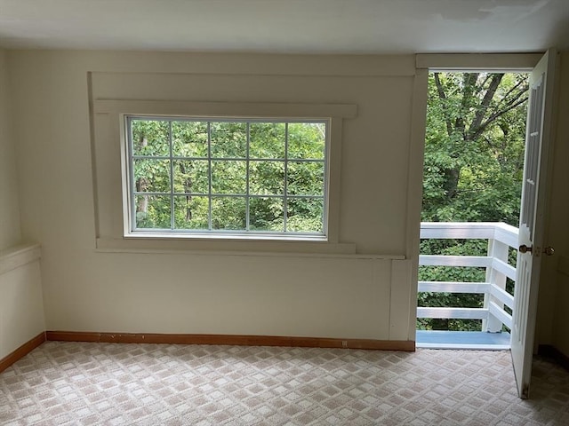 16 Knox St, Worcester, MA 01603 - entryway featuring healthy amount of natural light, carpet floors, and baseboards