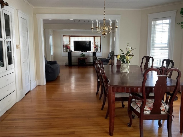 16 Knox St, Worcester, MA 01603 - dining area featuring light wood-style floors, ornamental molding, and a chandelier