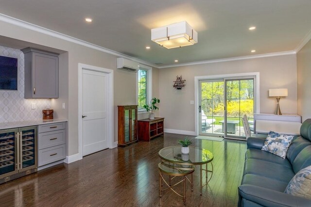 living room with crown molding, dark wood finished floors, a wall mounted air conditioner, baseboards, and beverage cooler