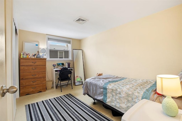 bedroom with visible vents