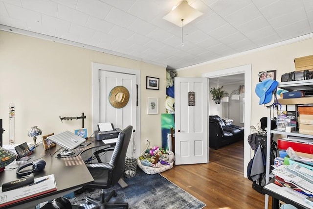 office featuring wood finished floors and crown molding