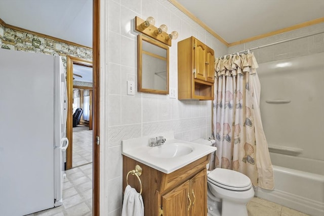bathroom with crown molding, vanity, shower / bath combo, toilet, and tile patterned floors