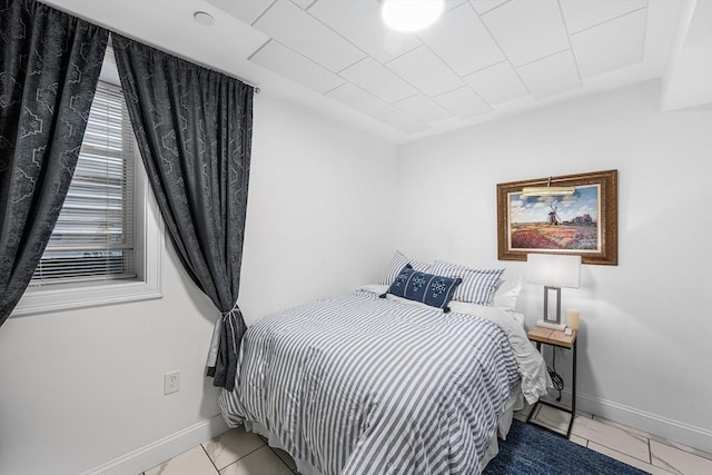 bedroom featuring baseboards