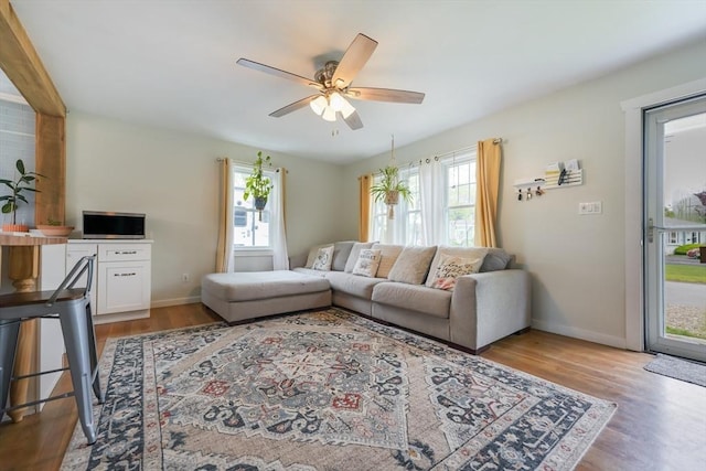 62 Greenbrier Dr, New Bedford, MA 02745 - living area featuring wood finished floors, ceiling fan, and baseboards