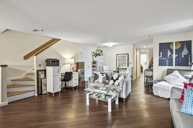 living room with dark hardwood / wood-style floors