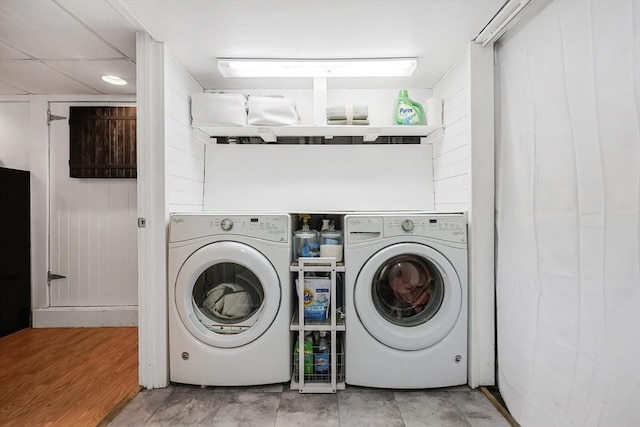 clothes washing area with laundry area and washing machine and dryer