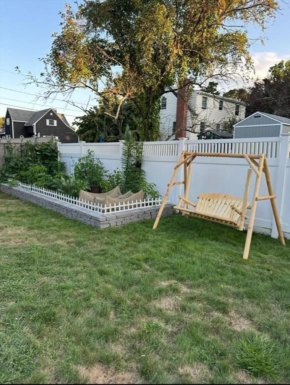 view of yard with a fenced backyard