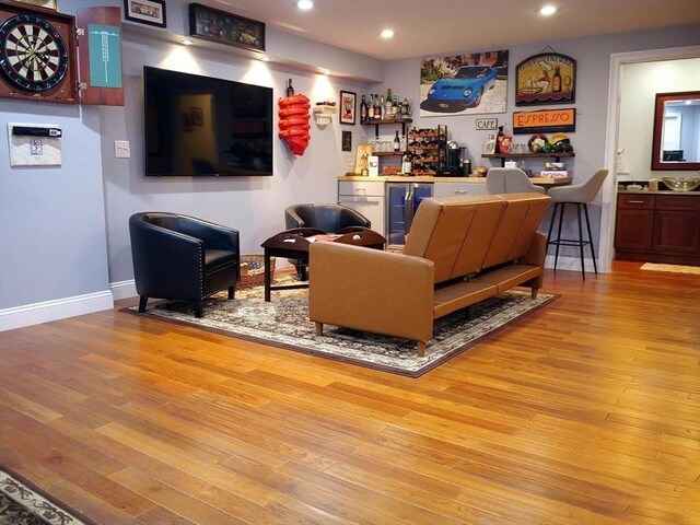 4 Bluebird Ln Unit 4, Killingly, CT 06241 - living room featuring a bar, beverage cooler, light wood-style flooring, recessed lighting, and baseboards
