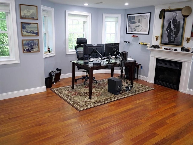 4 Bluebird Ln Unit 4, Killingly, CT 06241 - home office with wood finished floors, baseboards, a fireplace, and recessed lighting